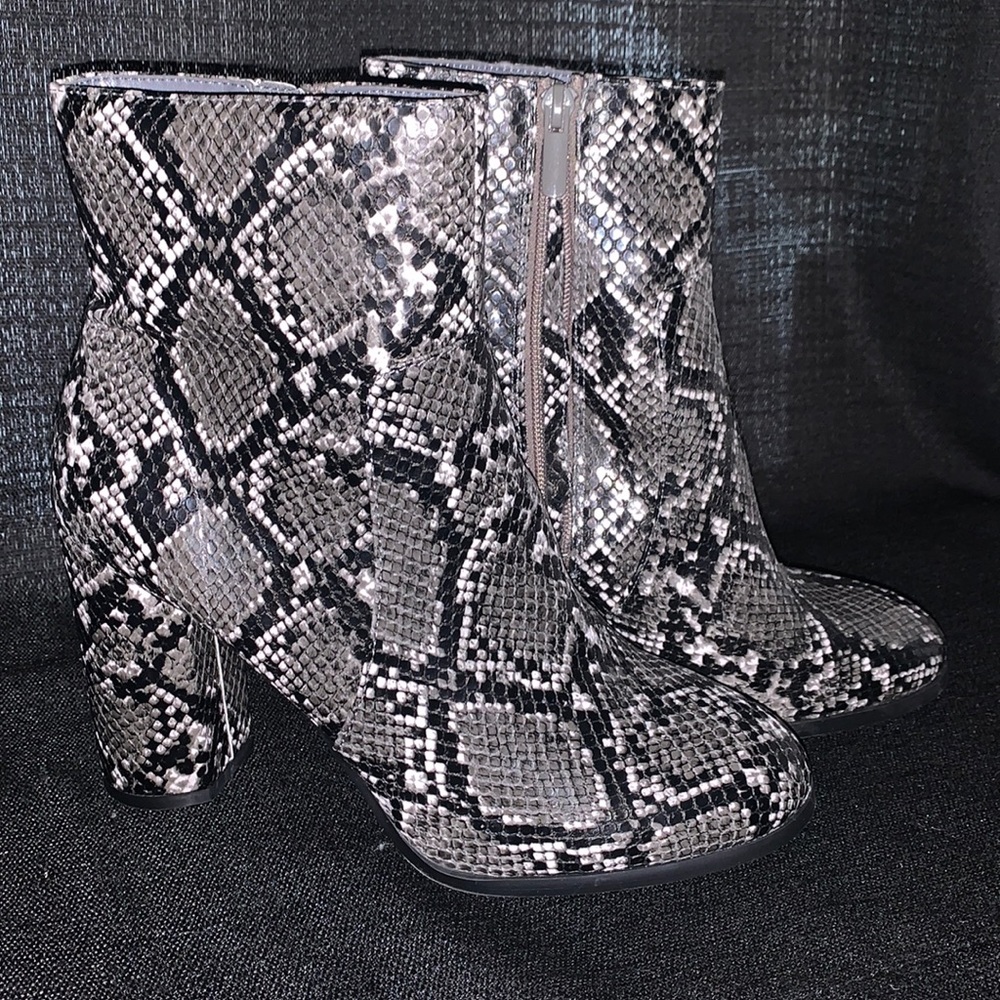 Snake print heel booties. Brand New, never worn!! From Forever 21!!